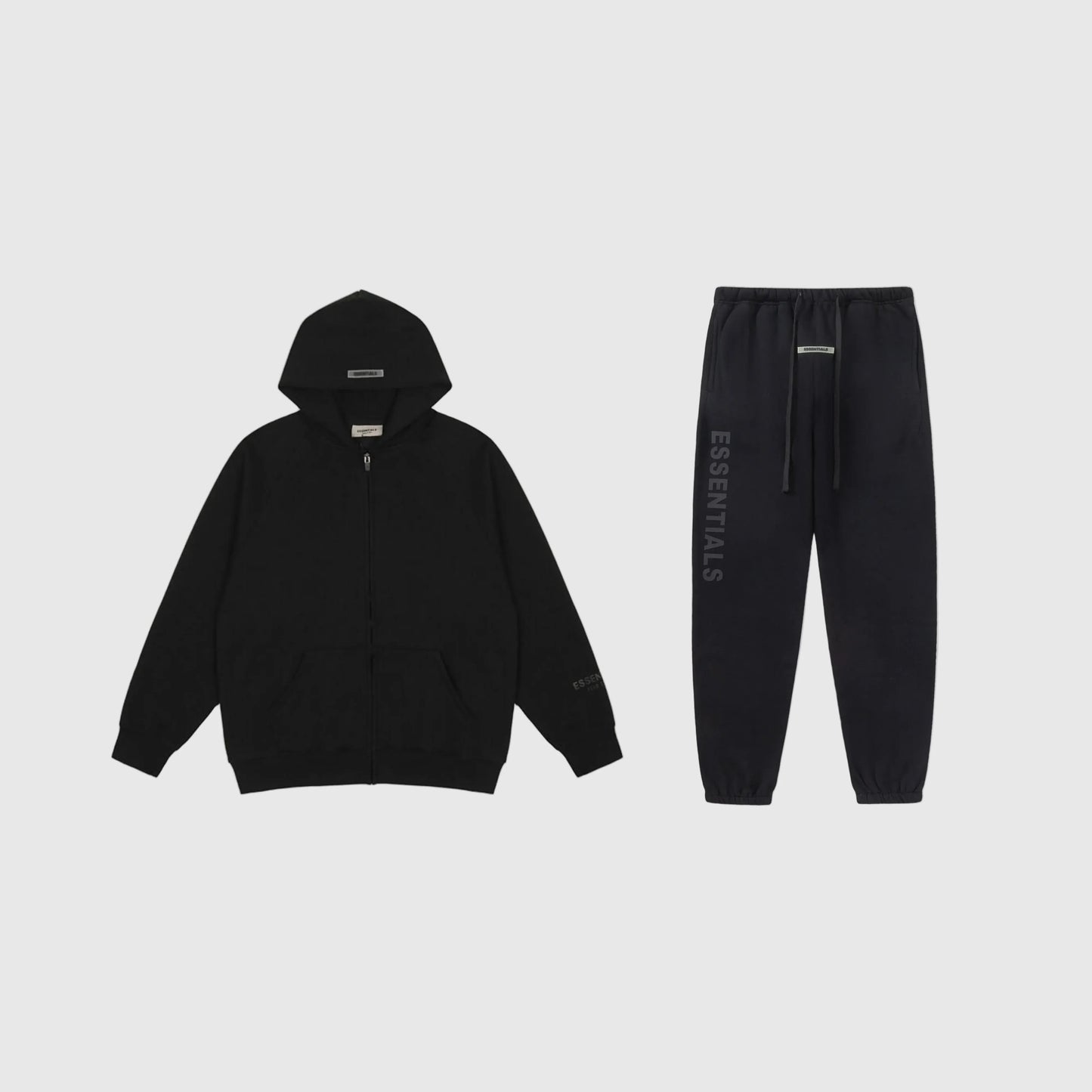 Fear of God Essentials black tracksuit set front view zip hoodie and joggers