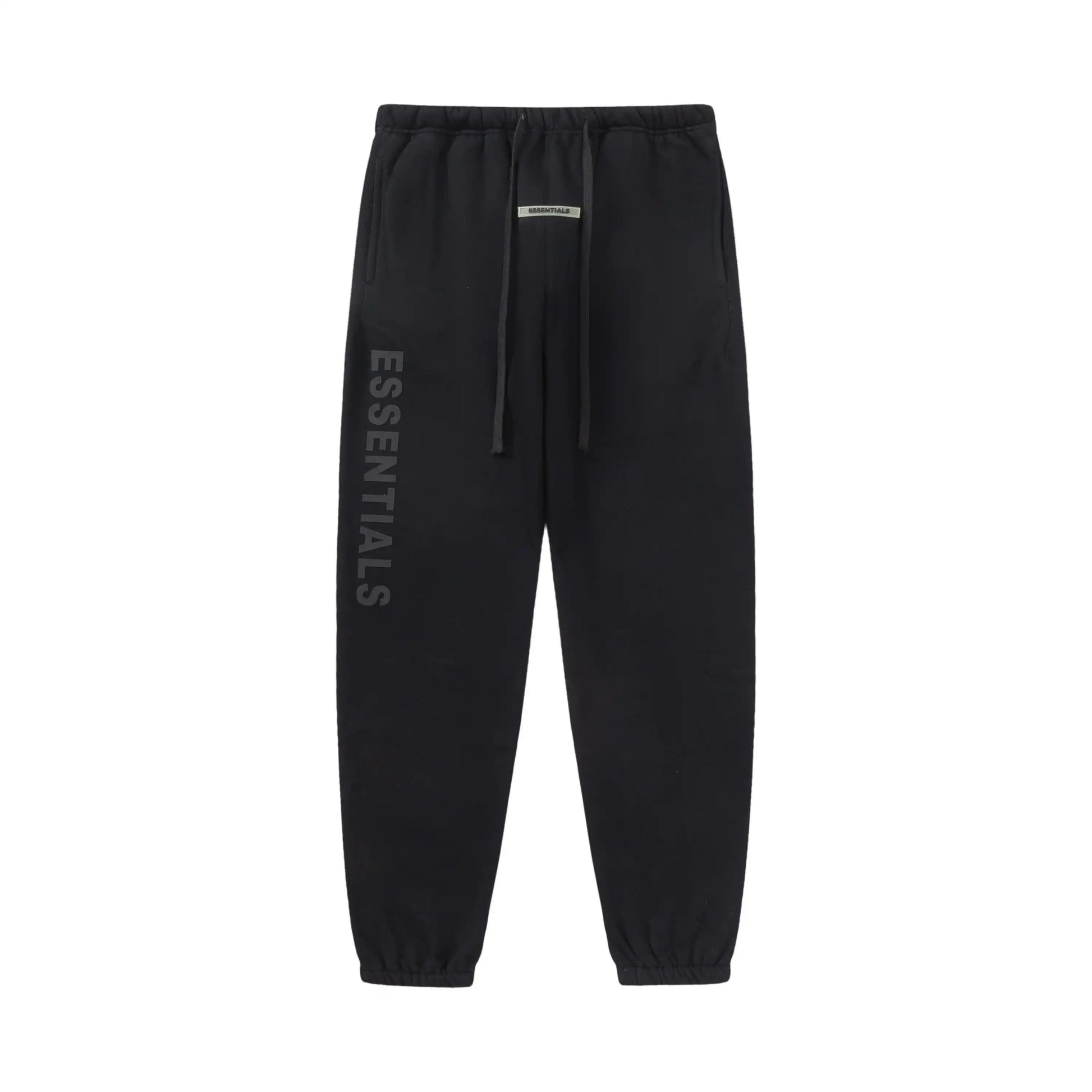 Black Essentials joggers soft-touch rubberized logo on leg close-up