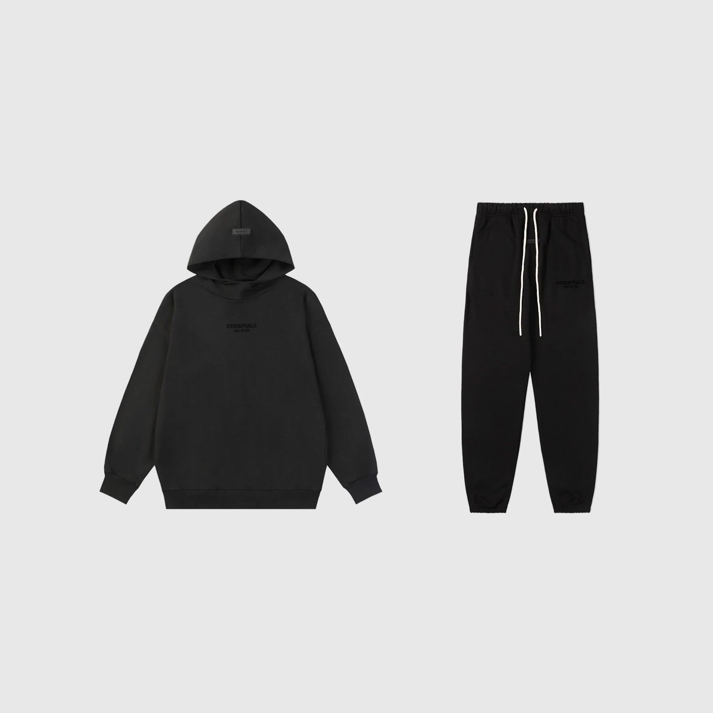 Fear of God Essentials black tracksuit set front view hoodie and joggers