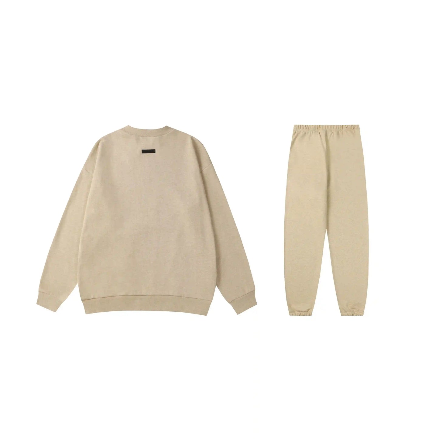 Essentials tracksuit calm shell angled view relaxed fit crewneck set
