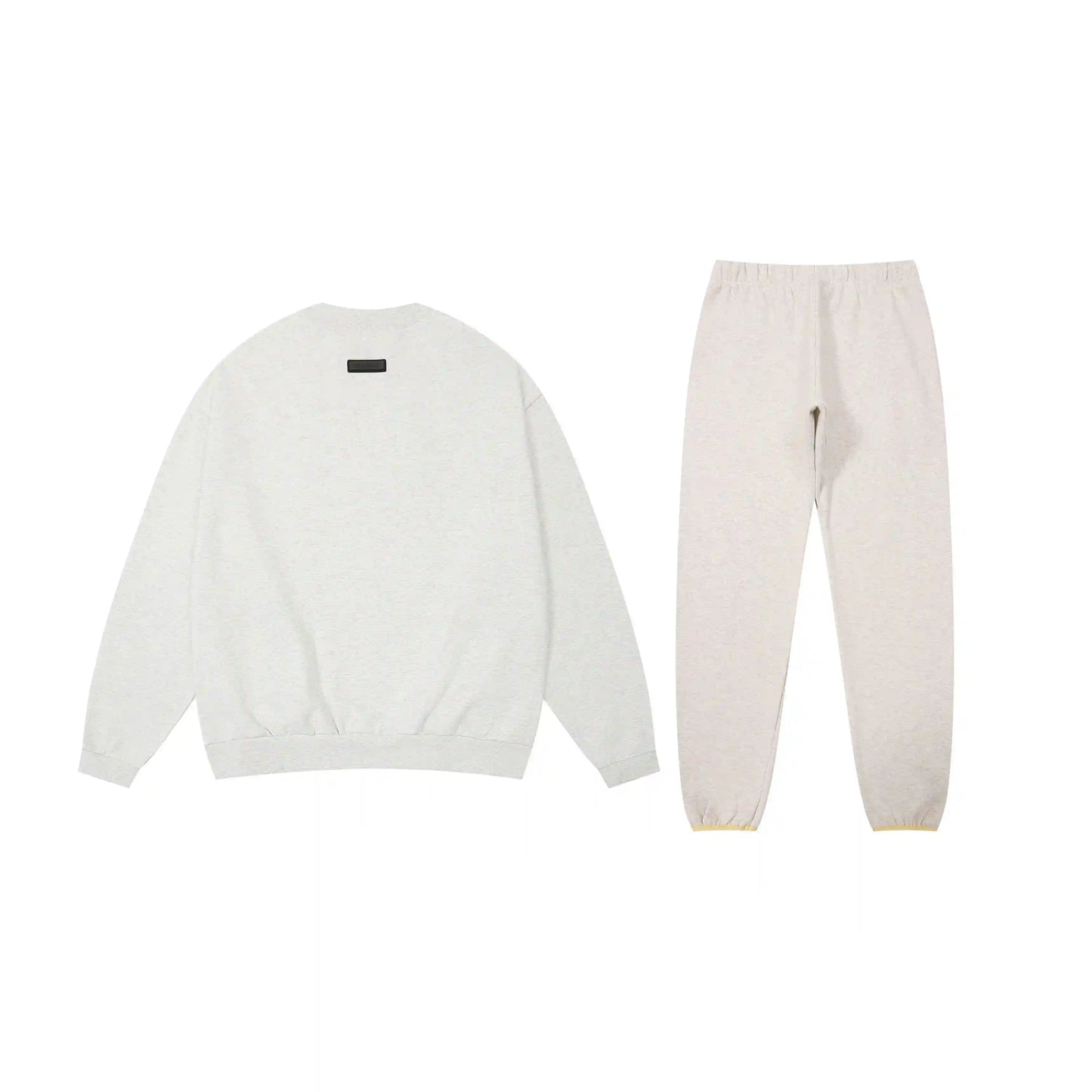 Essentials tracksuit cloud dance angled view relaxed fit crewneck set