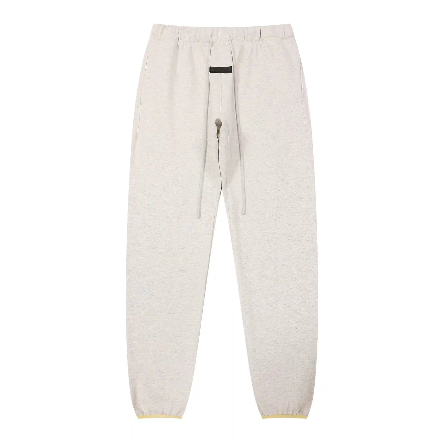 Cloud dance Essentials joggers soft-touch rubberized logo on leg close-up