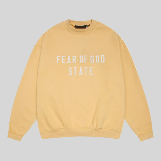 Fear of God Essentials garden yellow crewneck sweatshirt front view core fleece