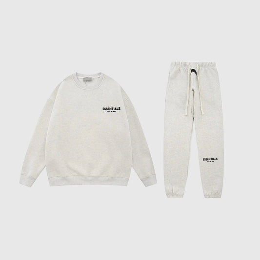 Essentials light heather oatmeal everyday fleece tracksuit with relaxed fit by Fear Of God