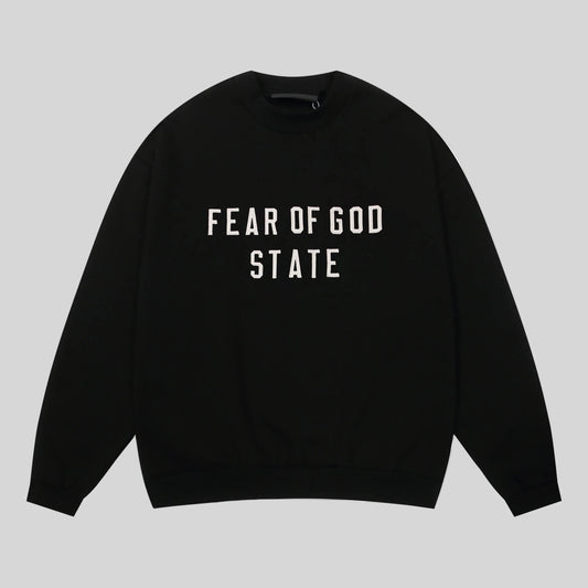 Fear of God Essentials black crewneck sweatshirt front view 380gsm core fleece