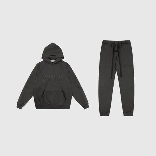 Fear of God Essentials black tracksuit set front view hoodie and joggers