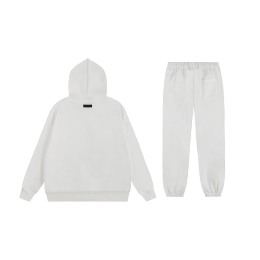 Essentials tracksuit cloud dance full set angled view relaxed fit