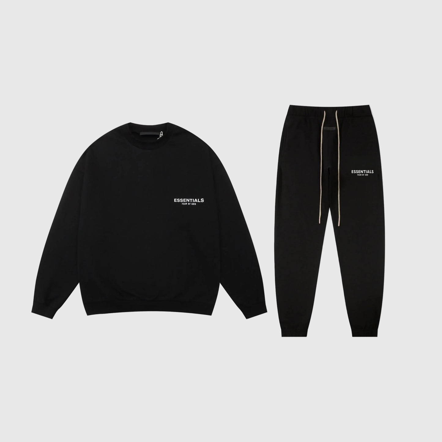 Essentials black classic everyday fleece tracksuit set with relaxed fit by Fear Of God