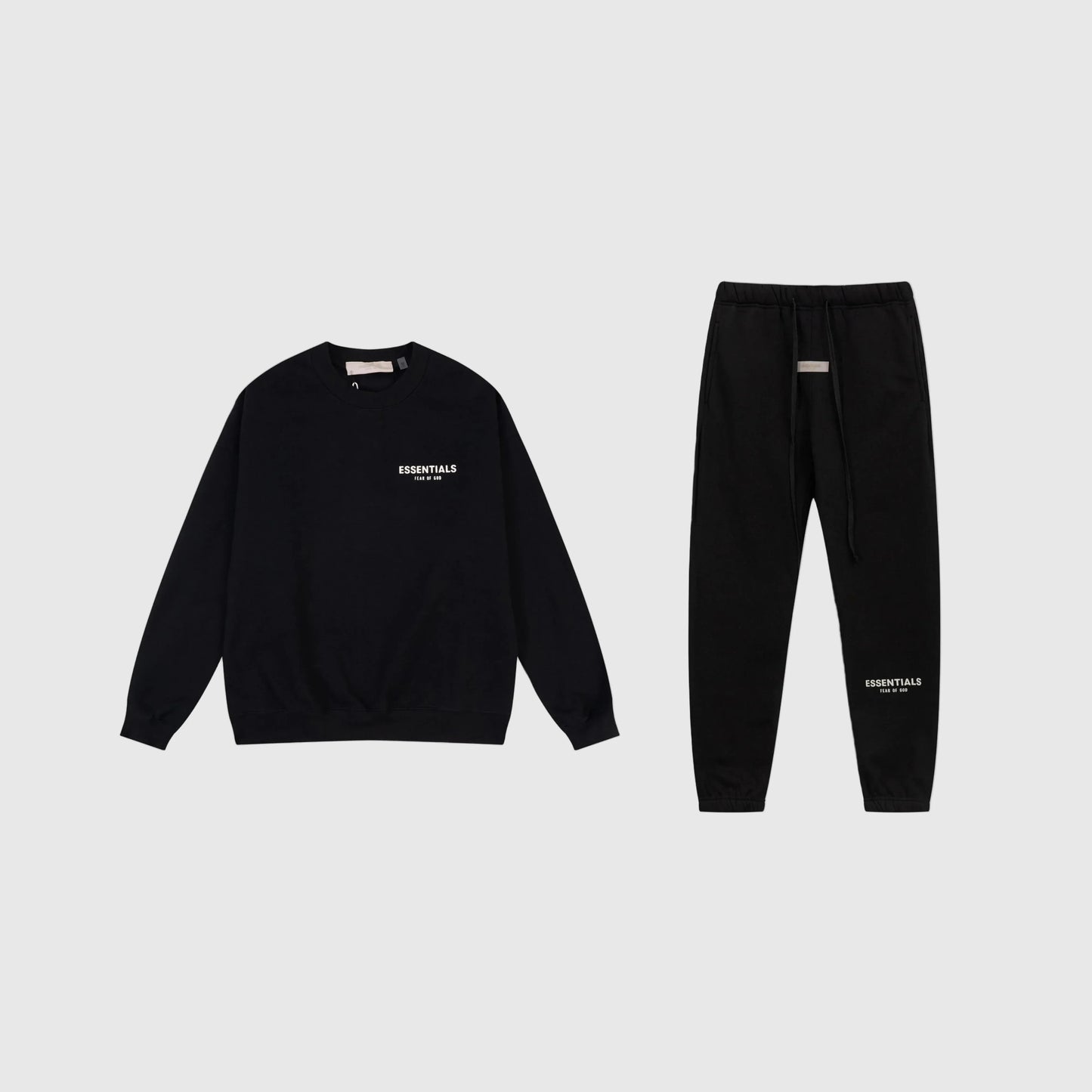 Fear of God Essentials black tracksuit front view crewneck and joggers