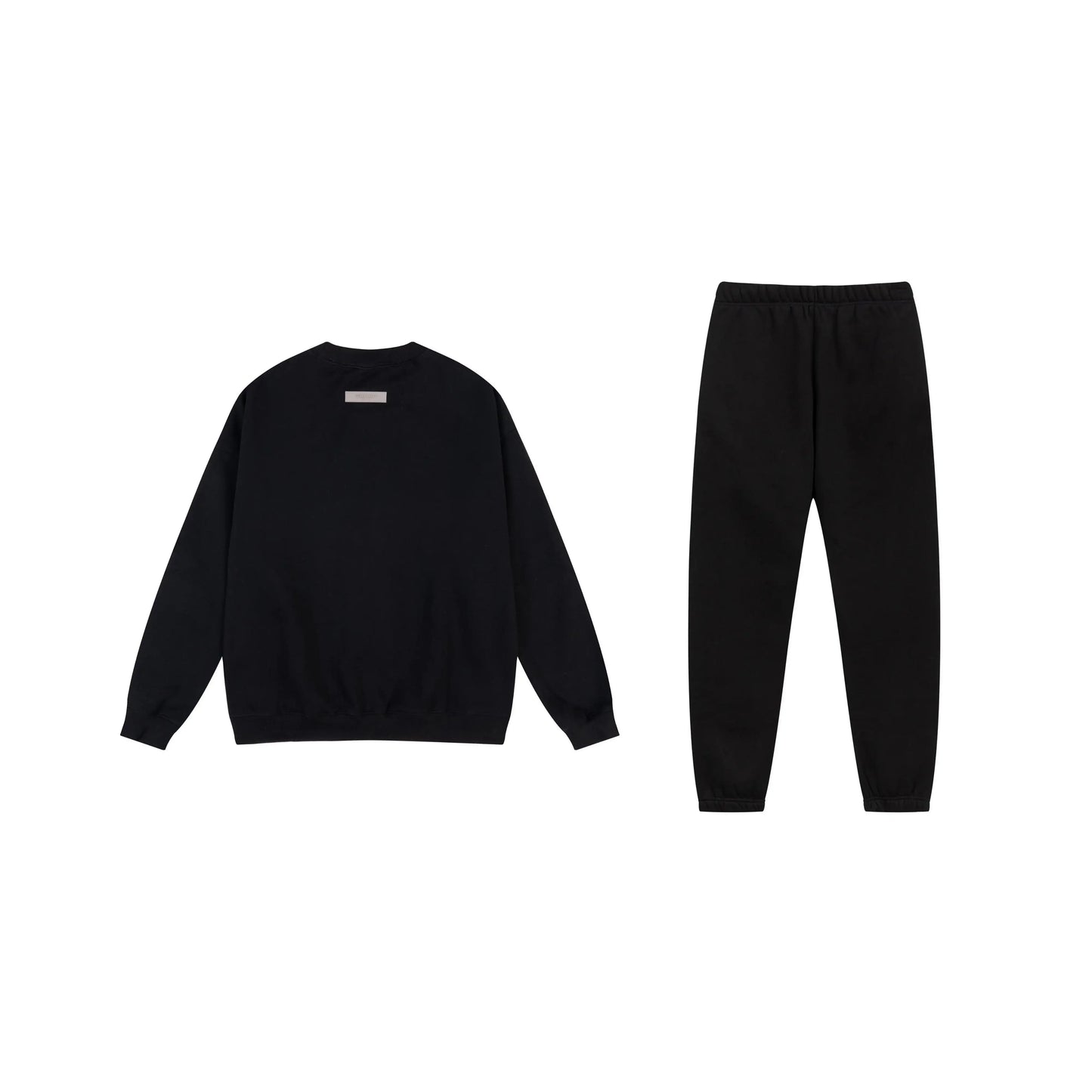 Essentials tracksuit black full set angled view relaxed fit