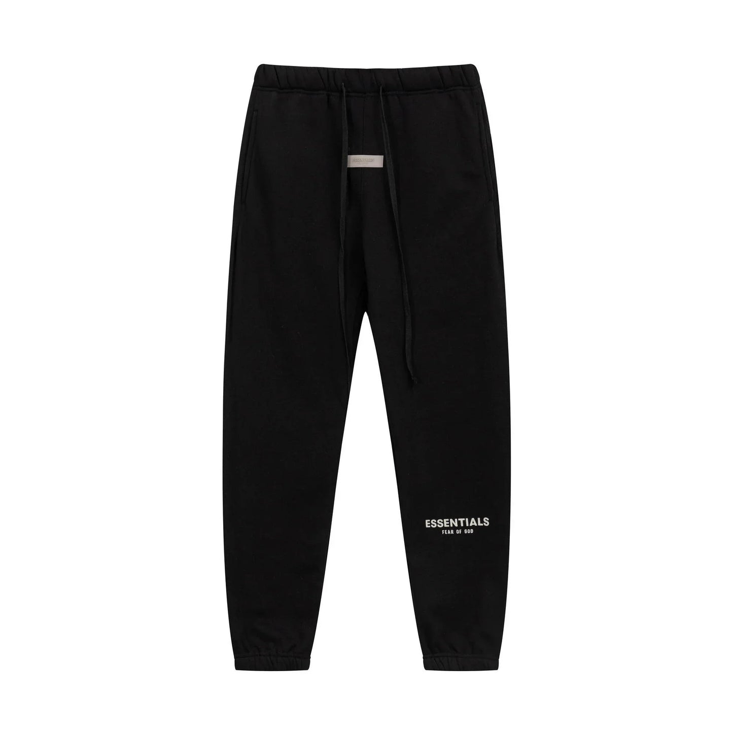 Black Essentials joggers soft-touch rubberized logo on leg close-up