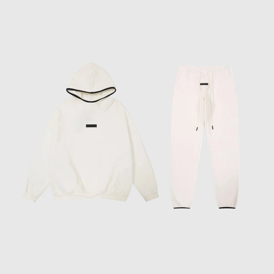 Essentials eggshell cozy fleece tracksuit set with relaxed fit by Fear Of God