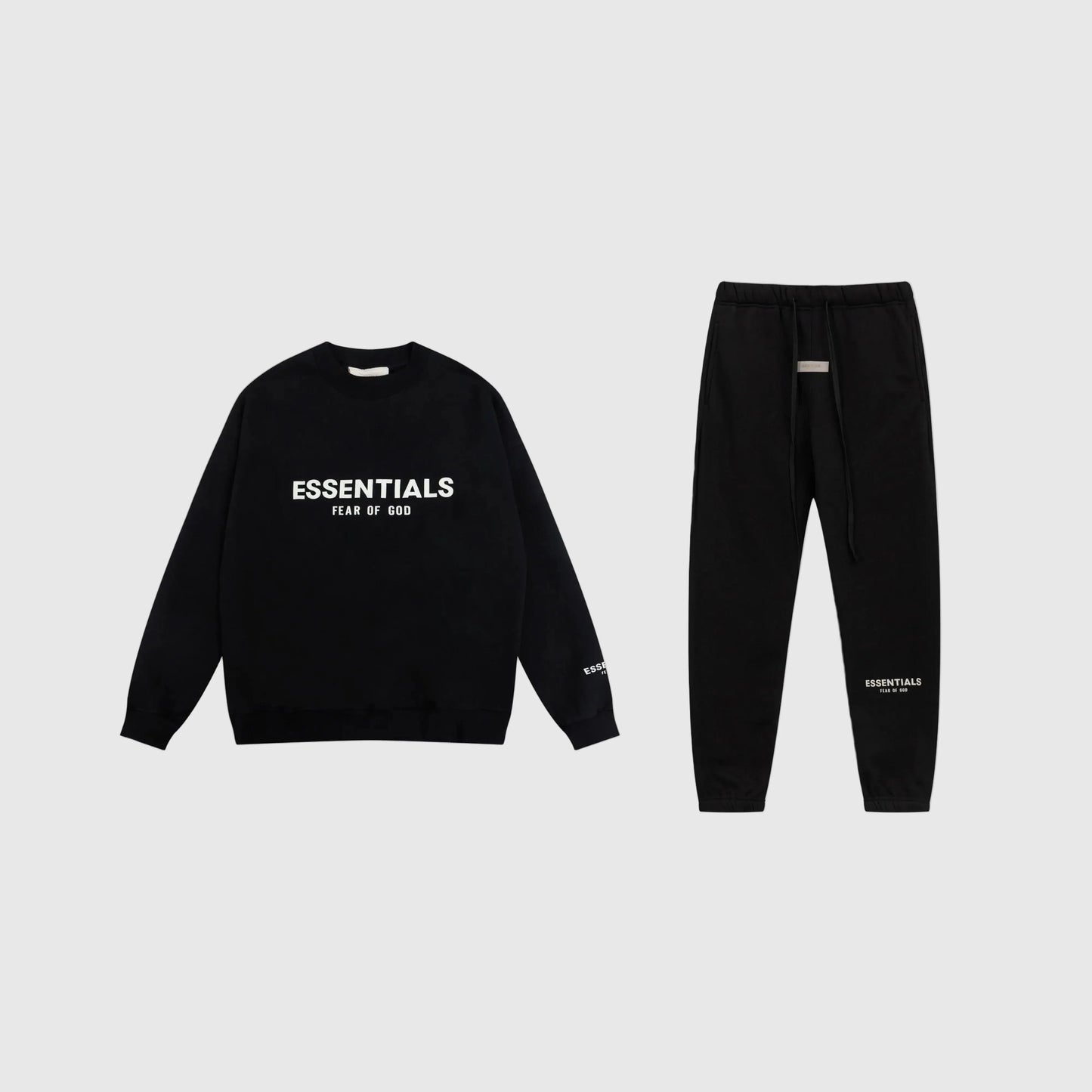 Fear of God Essentials black tracksuit front view crewneck and joggers