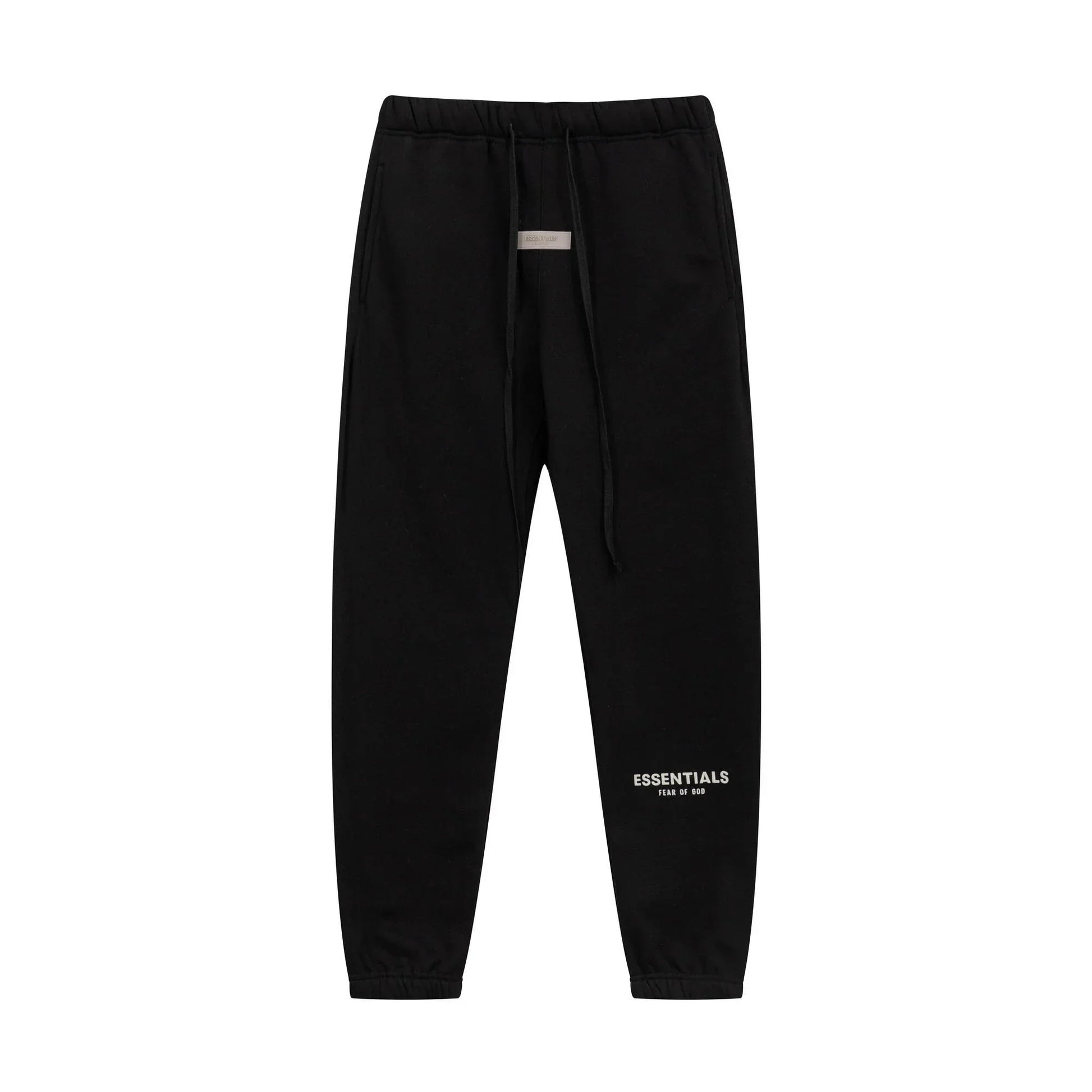 Black Essentials joggers soft-touch rubberized logo on leg close-up