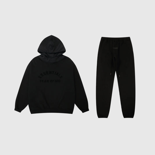 Fear of God Essentials black tracksuit set front view hoodie and joggers