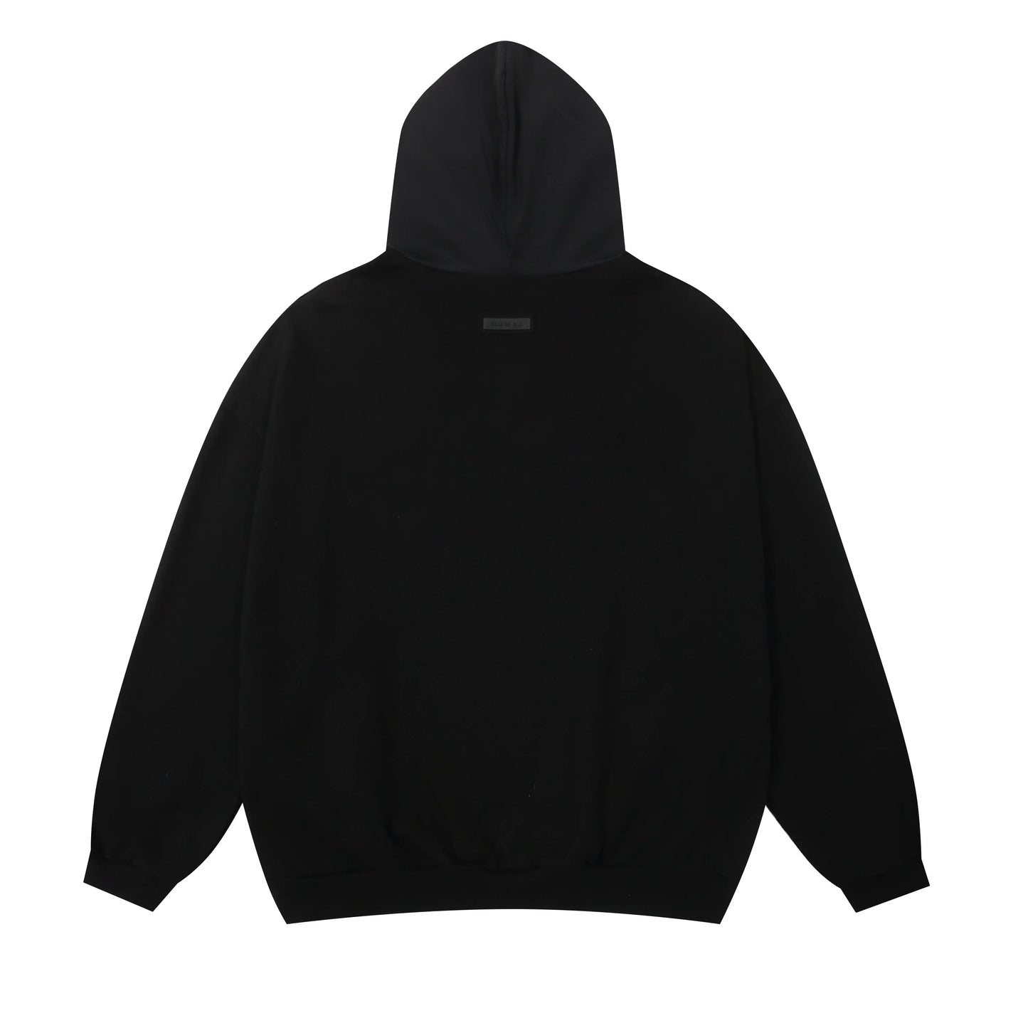 Black Essentials joggers soft-touch rubberized logo on leg close-up