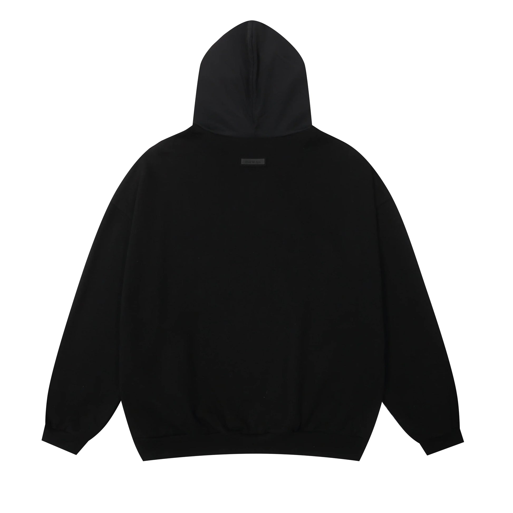 Black Essentials joggers soft-touch rubberized logo on leg close-up