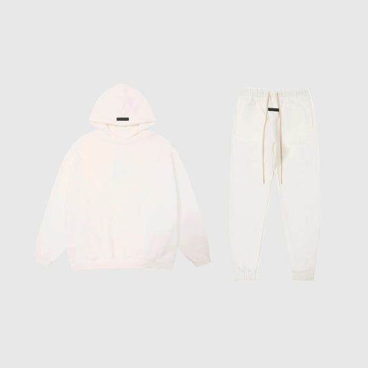 Essentials eggshell relaxed comfort fleece tracksuit set with relaxed fit by Fear Of God