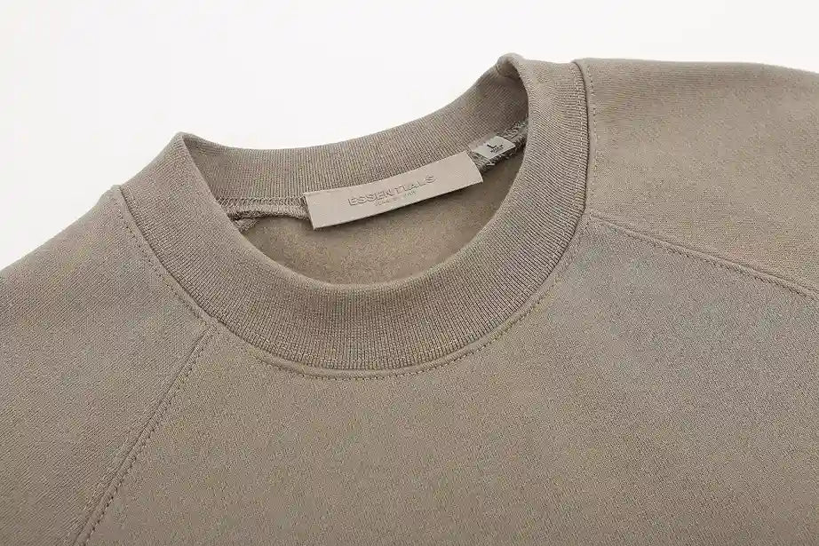 Essentials sandrift crewneck sweatshirt side view relaxed fit