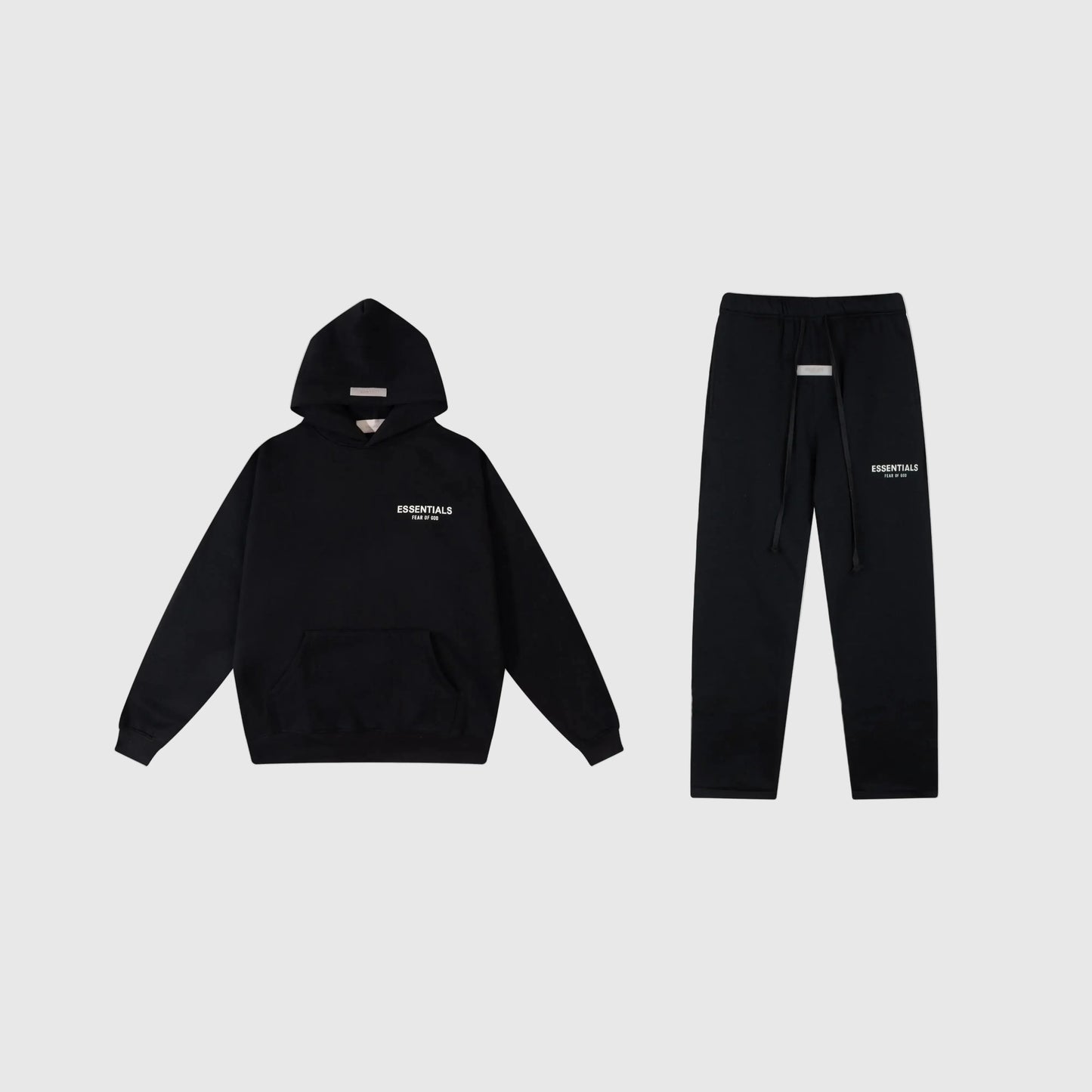 Fear of God Essentials black tracksuit front view hoodie and joggers