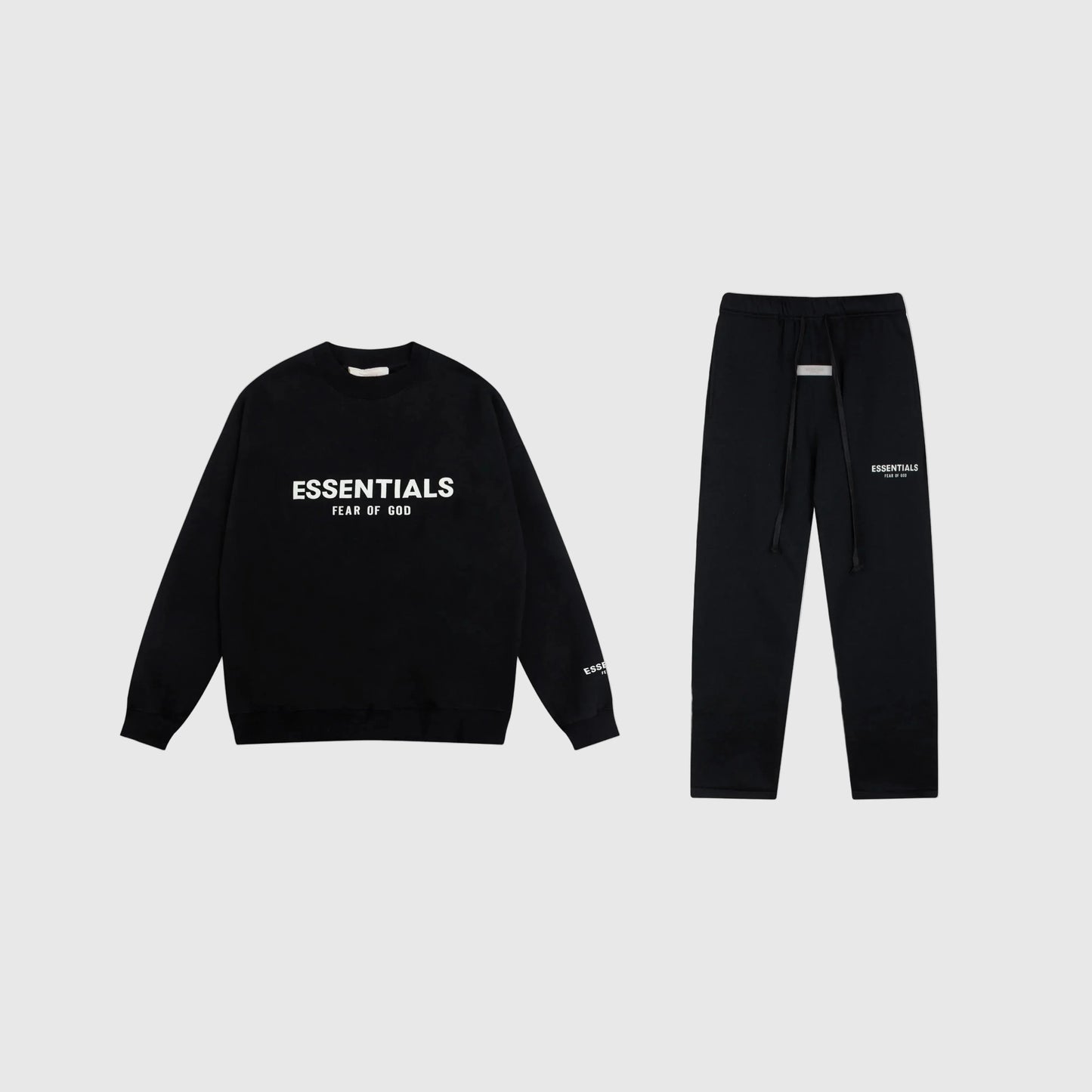 Fear of God Essentials black tracksuit front view crewneck and joggers
