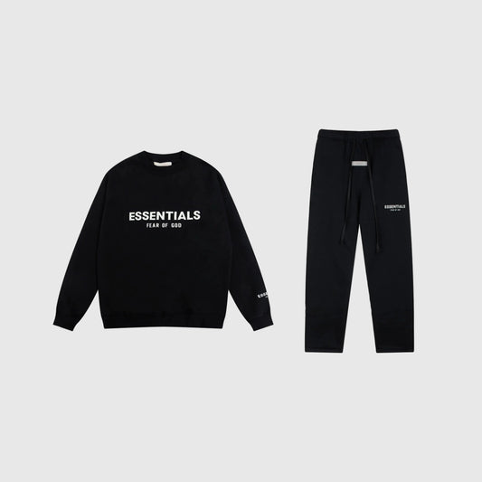 Fear of God Essentials black tracksuit front view crewneck and joggers