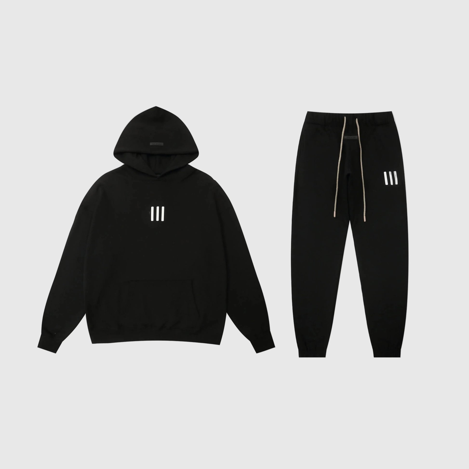 Essentials black comfort fleece set with relaxed casual fit by Fear Of God