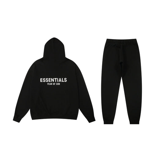 Essentials black comfort fleece hoodie with soft interior detail by Fear Of God