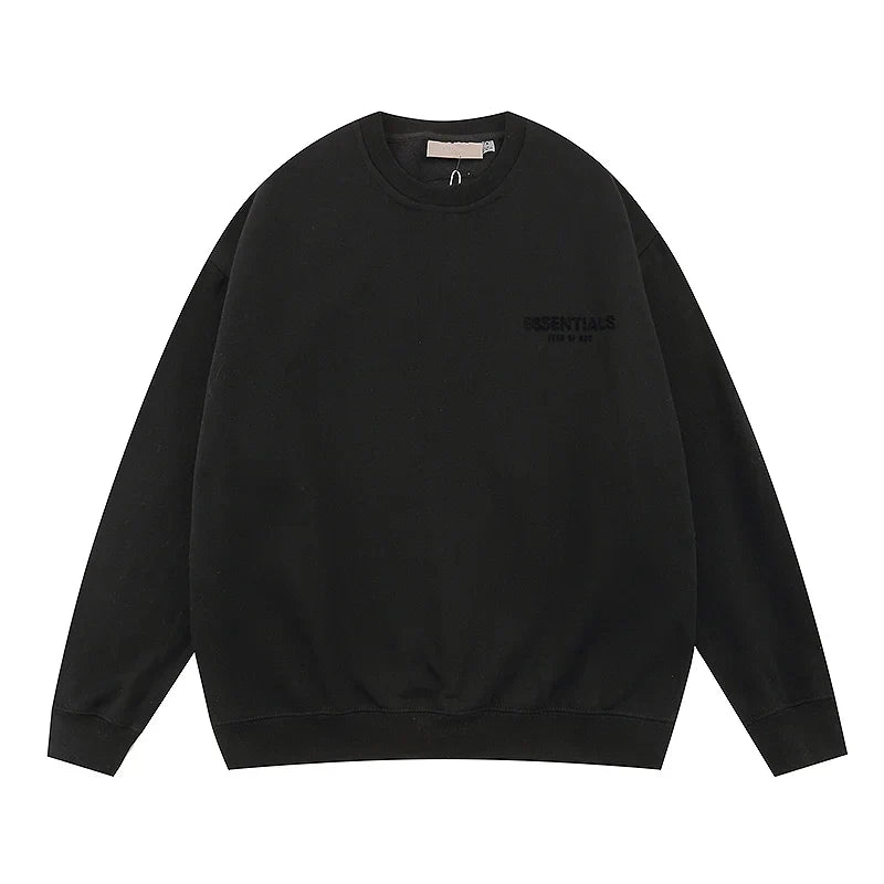 Back view of Essentials black fleece everyday tracksuit by Fear Of God

