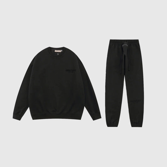 Essentials black fleece hoodie with soft interior detail by Fear Of God

