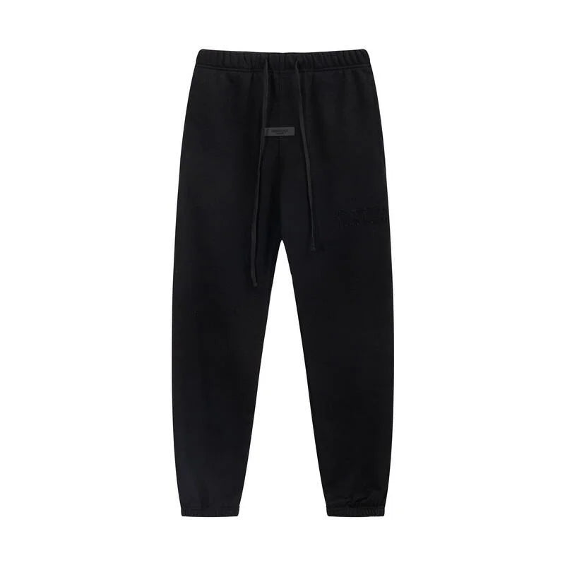 Back view of Essentials black luxe fleece tracksuit set by Fear Of God