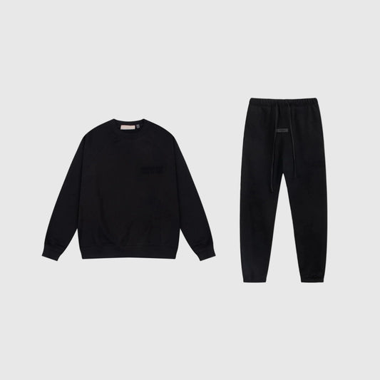 Essentials black luxe fleece tracksuit set with relaxed fit by Fear Of God