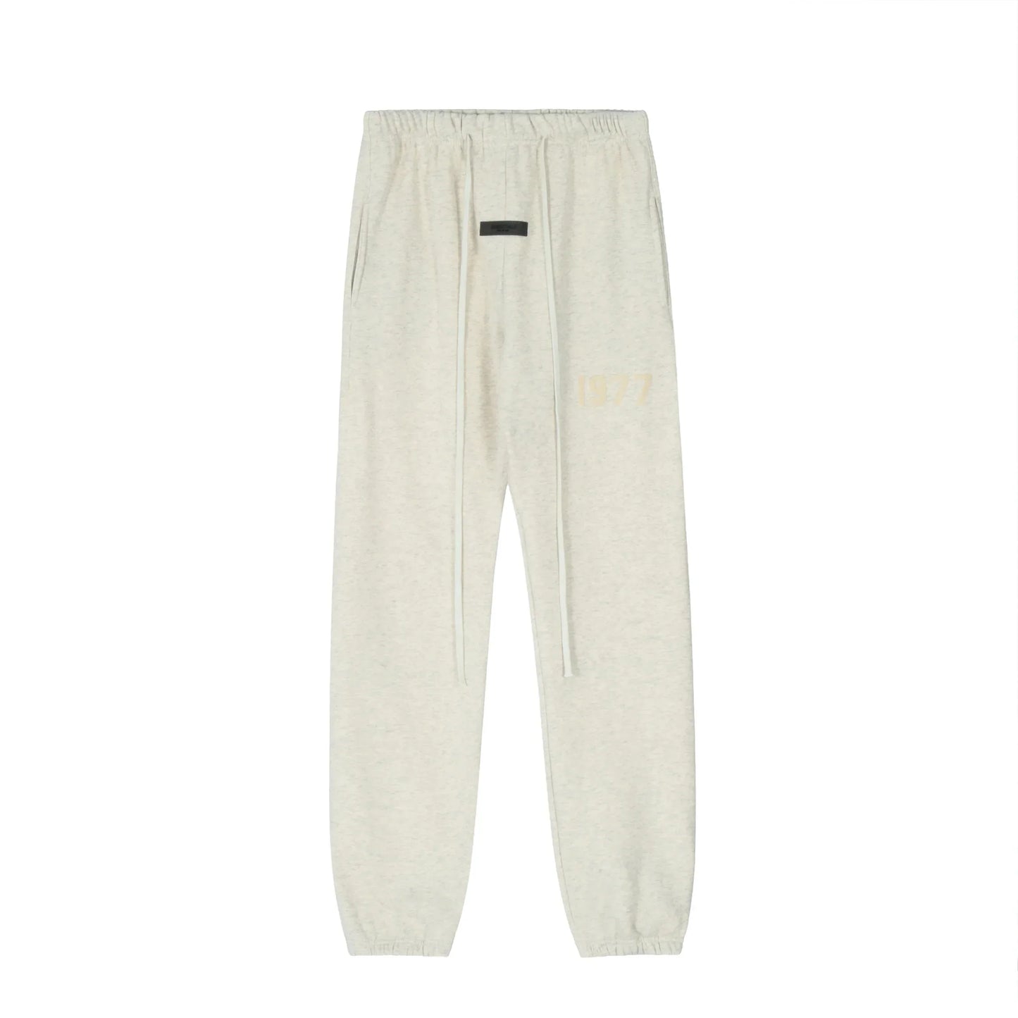 Back view of Essentials cloud dance fleece tracksuit set by Fear Of God

