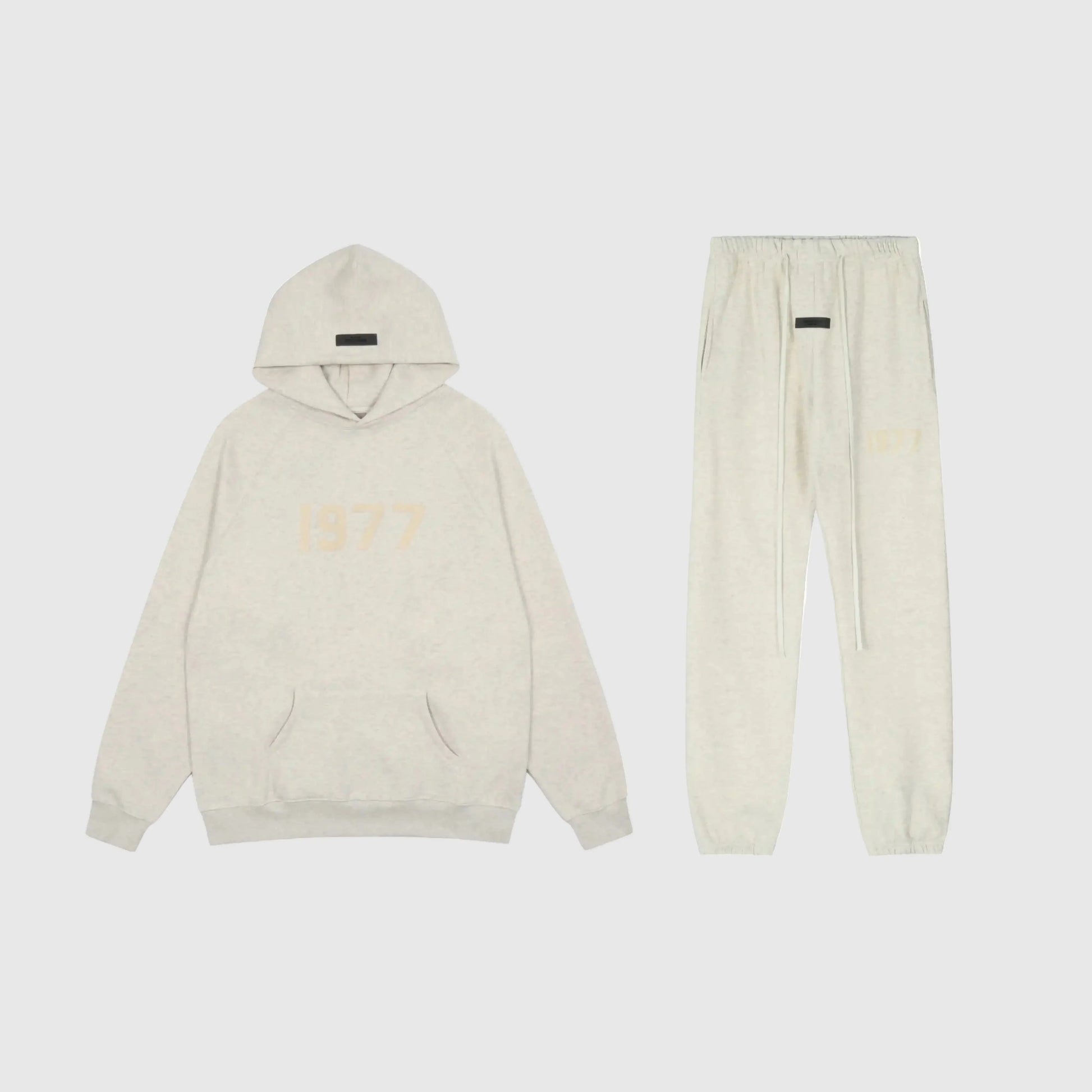 Essentials cloud dance fleece tracksuit set with relaxed fit by Fear Of God