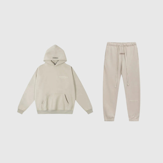 Essentials light heather oatmeal fleece tracksuit set with relaxed fit by Fear Of God
