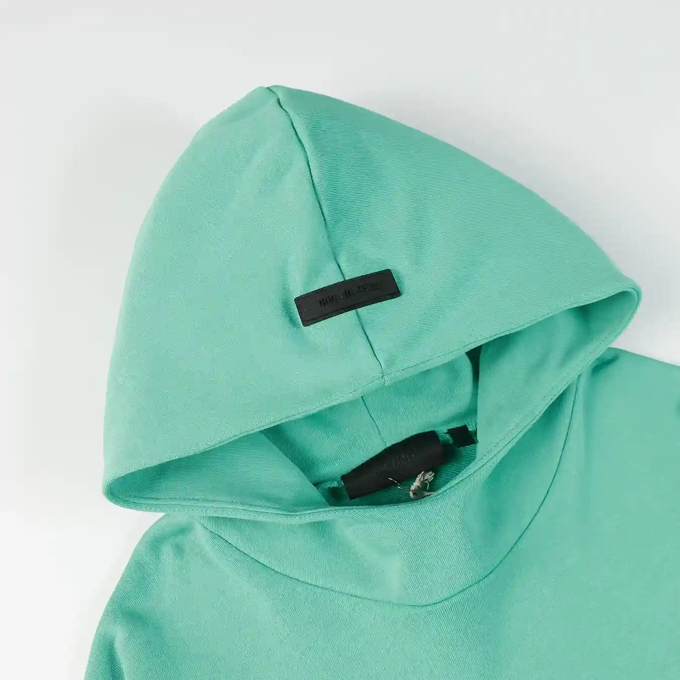 essentials aqua green hoodie front view casual style