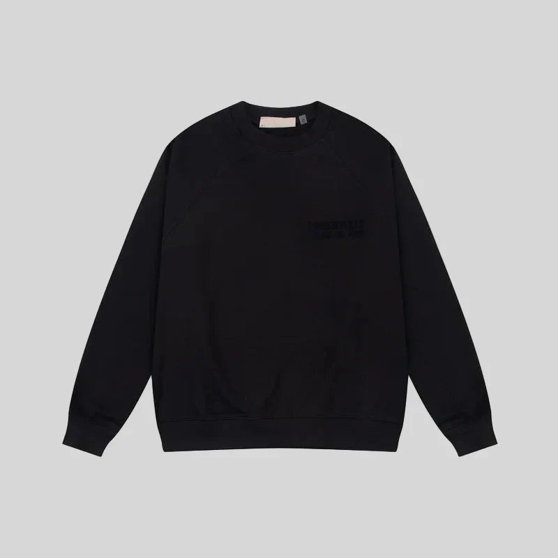 Fear of God Essentials black crewneck sweatshirt front view 380gsm core fleece
